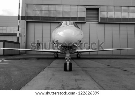 White reactive private jet, the front landing gear