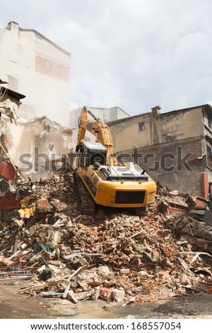 demolition excavator in the old part of the city, Istanbul, Turkey