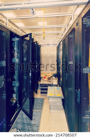 open racks in the data center, the cold aisle and equipment on the floor