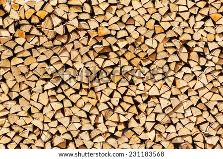 stack birch firewood in Russia, natural background