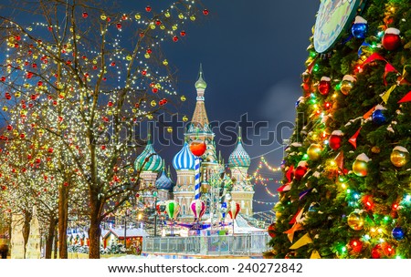 Decorations for New Year and holidays. Christmas balls on tree branches near to St. Basil's Cathedral on Red square in Moscow