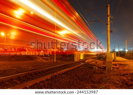 public transport metropolis, traffic and blurry lights train at night, Moscow, Russia