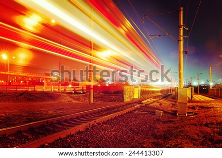 public transport metropolis, traffic and blurry lights train at night, Moscow, Russia