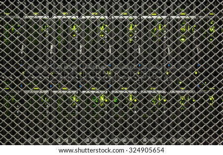 server hardware and the lights through a grid of server racks in the data center
