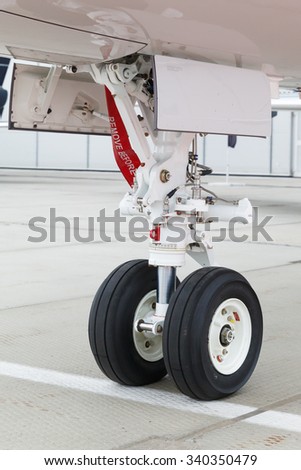 front landing gear and ladder in light business aircraft on the ground