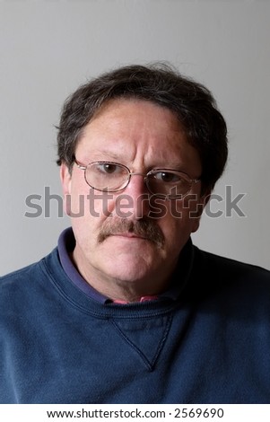 Middle aged man with a serious expression