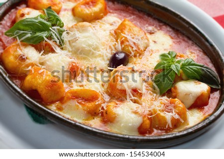 Delicious italian style casserole pasta dish with rich tomato sauce and plenty of shredded and melted mozzarella cheese.