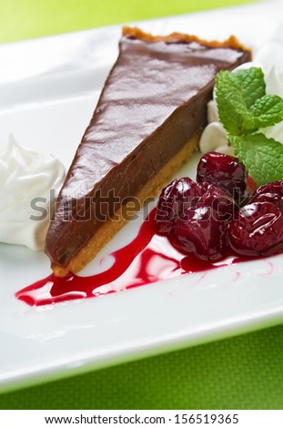 Chocolate tart, also known as chocolate cream pie, is a dessert consisting of dark chocolate, cream and eggs, beaten together, poured into a crisp, unsweetened puff pastry shell and baked until firm