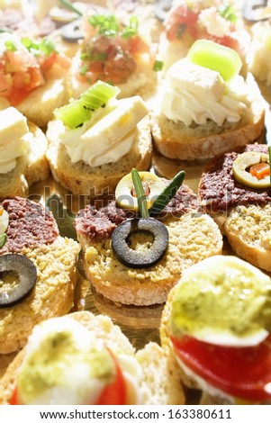Close up shot of a small catering sandwiches. Finger food and party concept