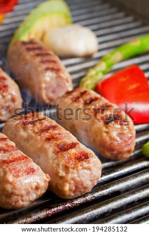 Grilling cevapcici on grill grate and served. Mouth watering photos of balkan food
