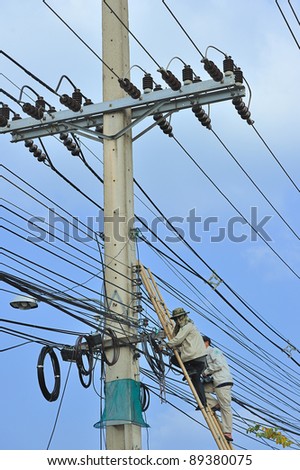 electricity Work People and the sky is blue.