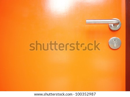 orange door with Metal door handle