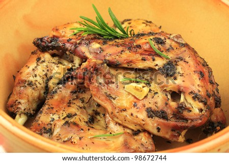Roast rabbit cooked in herbs and garlic