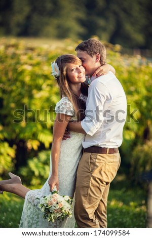 wedding. gently kiss the groom