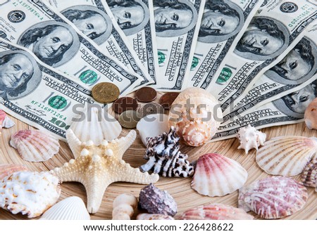 Seashells with money / holiday money
