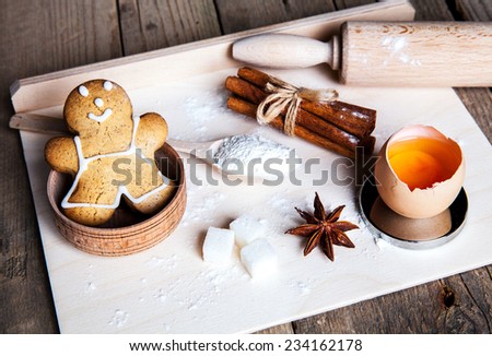 Christmas food. Gingerbread man cookies in Christmas setting. delicious dessert. New Year sweets. Spices, cinnamon and star anise