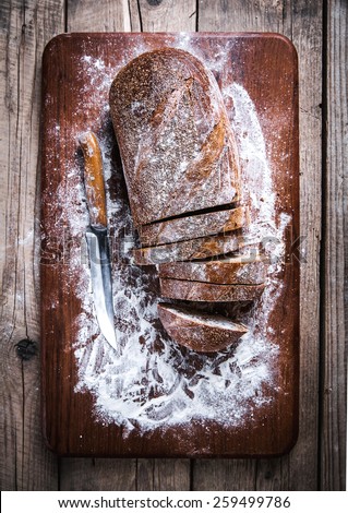 food. sliced rye bread on a wooden background. Bread flour