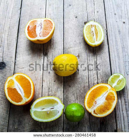 Smile of citrus on a wooden background. food, fruit