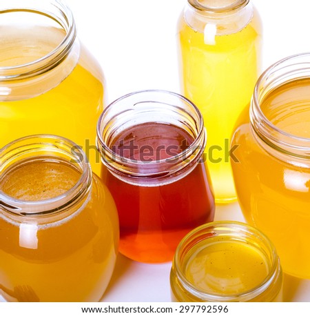 jars of honey on a white background. food, medicine