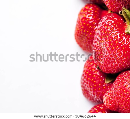 a bunch of strawberries. fruit