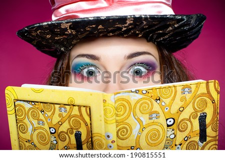 Makeup of young woman in the similitude of the Hatter (