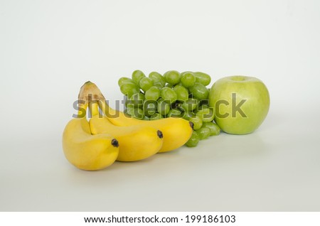 small set of fresh fruits on white background