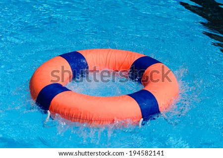 Life preserver on swimming pool.