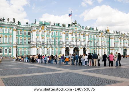 ST-PETERSBURG, RUSSIA - JULY 07: Many people lined up to enter the Hermitage in July 07, 2009 in St-Petersburg, Russia. Hermitage is one of the largest and oldest museums in the world.