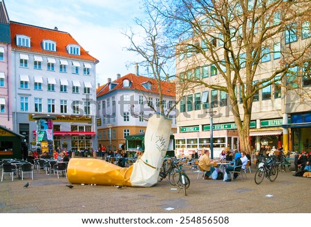 COPENHAGEN, DENMARK - APRIL 13, 2010: Big Cigarette butt installation on Kultorvet (Coal Market) Square in Old Town. Was designed to fight litter