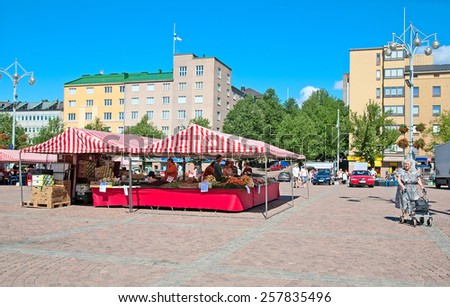 LAHTI, FINLAND - JULY 17, 2010: Stalls with fresh vegetables on Market Square in the center of Lahti