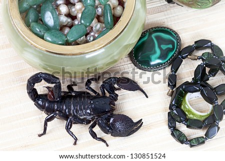 Emperor Scorpion with onyx jewelry box, malachite brooch and black necklace