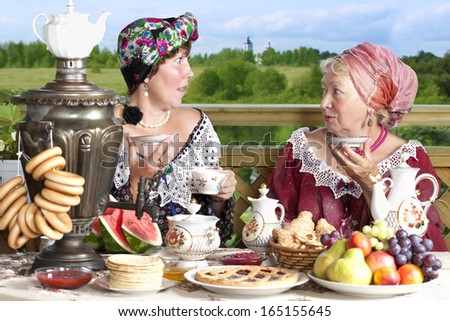 Vintage styled photograph of mature women drinking tea. Kustodiev Russian artist style