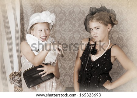 Vintage style portrait of little girls. Intentional 1900\'s style post processing emulation.