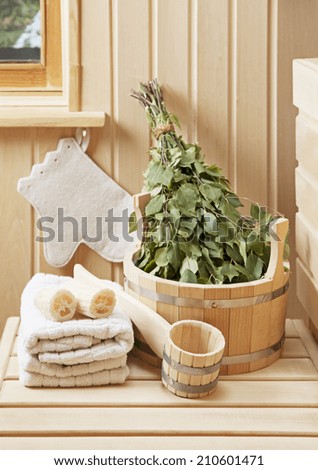 Detail of sauna interior with traditional sauna accessories Detail of sauna interior with traditional sauna accessories