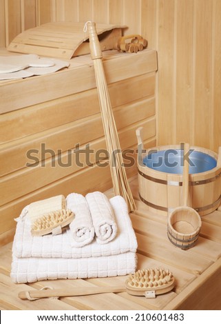 Steam bath room with traditional sauna accessories