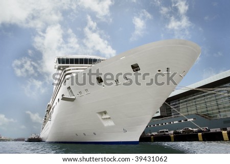 Giant cruise shipped moored at a dock