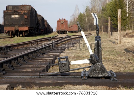 Manual railroad switch by the rail with point indicator