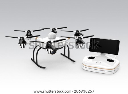 Hexacopter and remote controller isolated on gray background. RC controller docking with smartphone. Clipping path available.