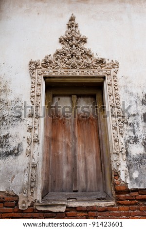 Ancient Wooden Windows With Stucco Pattern Frame Of Buddhist Temple