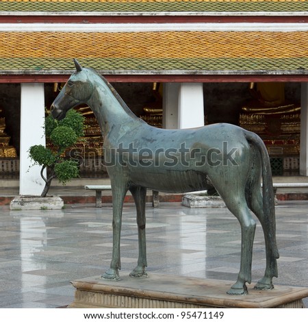 stone horse statue in buddhist temple