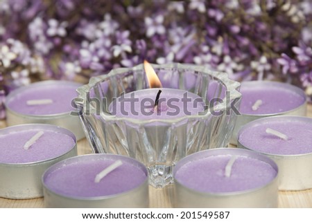 Scented candles with the scent of lilacs.