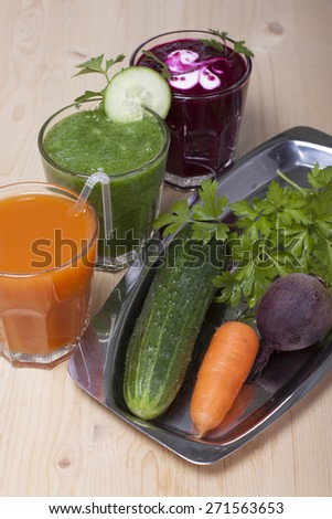 Smoothie from cucumbers, carrots and beets, parsley and celery.