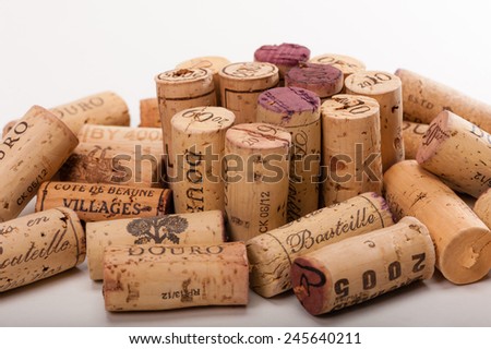Several Wine Corks on a white background. You can read \
