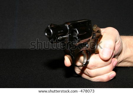 Gun pointed at camera