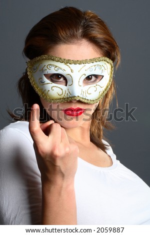 Brunette wearing a mask asking person to join