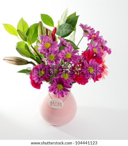 Pretty pink flowers in pink Mother\'s Day vase for mom
