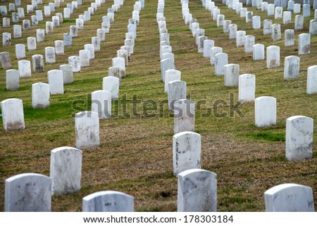 Abstract rows of gravestones honoring US veterans at Fort Rosecrans National Cemetary at Point Loma in San Diego, California