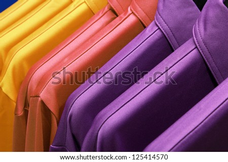 background of colorful clothes on a hanger