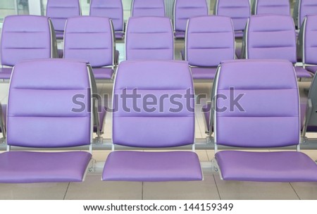 roll of purple chair at the airport
