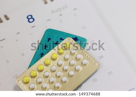 birth control pills on a calendar